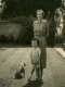 With his mother in their garden, September 1949